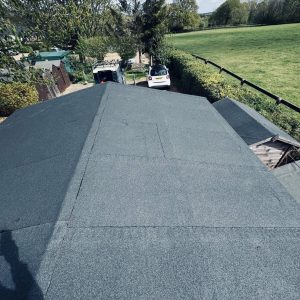 Reboarded & Refelted Community Out Building